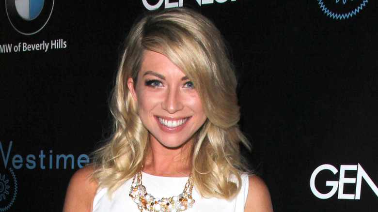 Stassi Schroeder smiling at a BMW Beverly Hills event in 2014