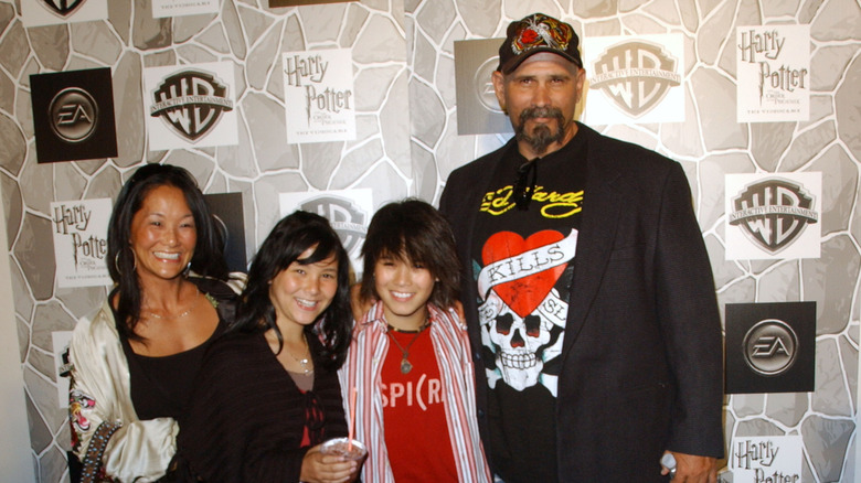 Fivel Stewart posing with brother Booboo Stewart and their parents