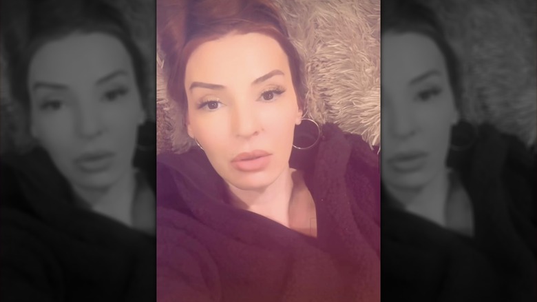Drita D'Avanzo laying on a rug in 2025